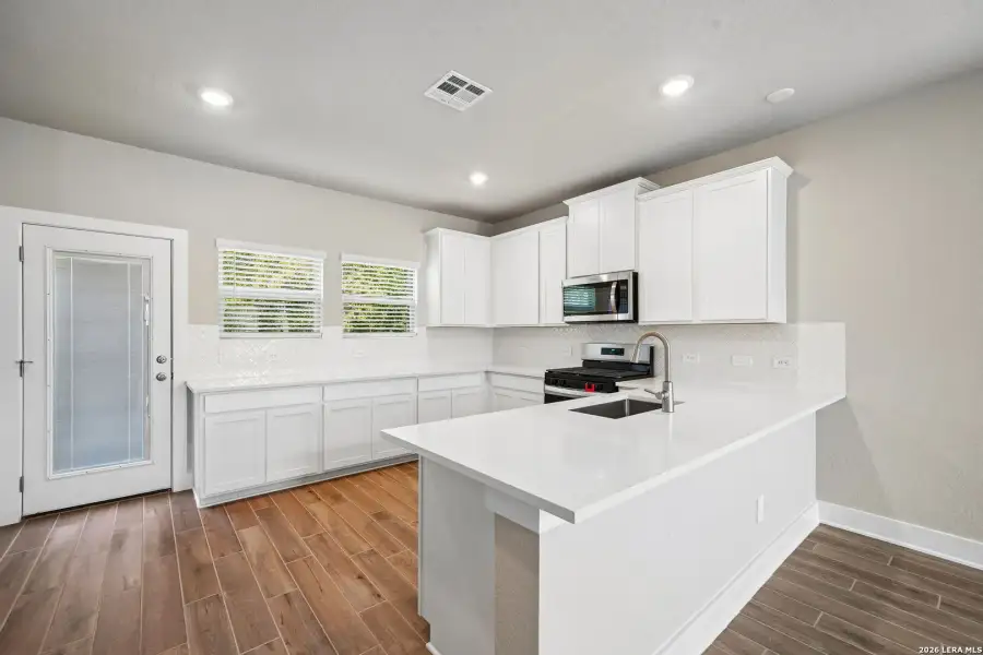 Furnished interior view inside a new home in Comanche Ridge, San Antonio (Image 14).