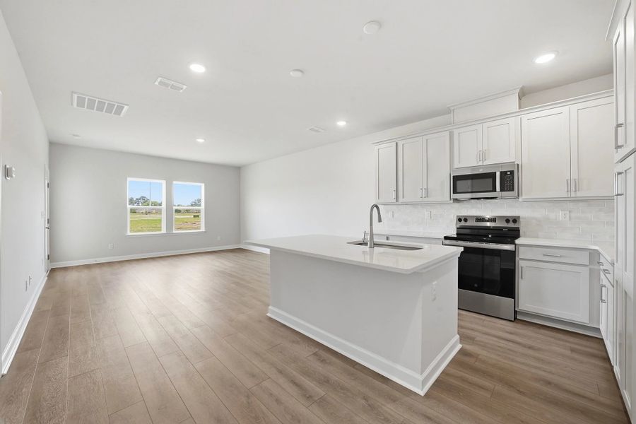 Furnished interior view inside a new home in Blue Heron Retreat, Little River (Image 4).