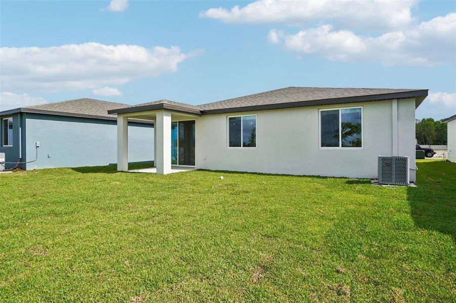 Exterior details and patio area of a home in Pine Ridge Meadows, Hudson (Image 24).