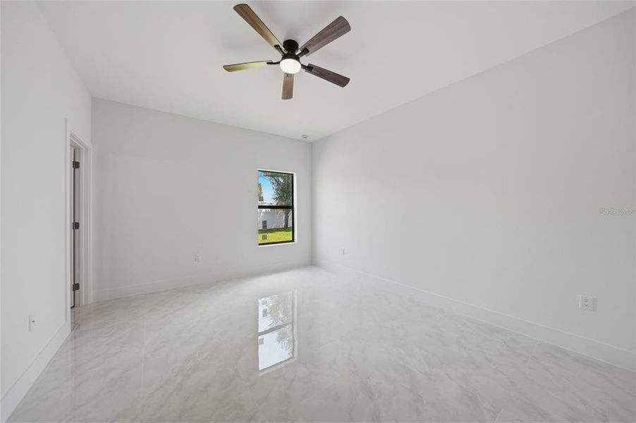 Spacious, unfurnished interior of a new home in , Port Charlotte (Image 31).