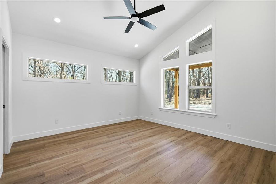 Master bedroom with windows that let in natural light!