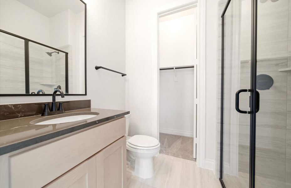 Furnished interior view inside a new home in Bridgeland 60′, Cypress (Image 8).