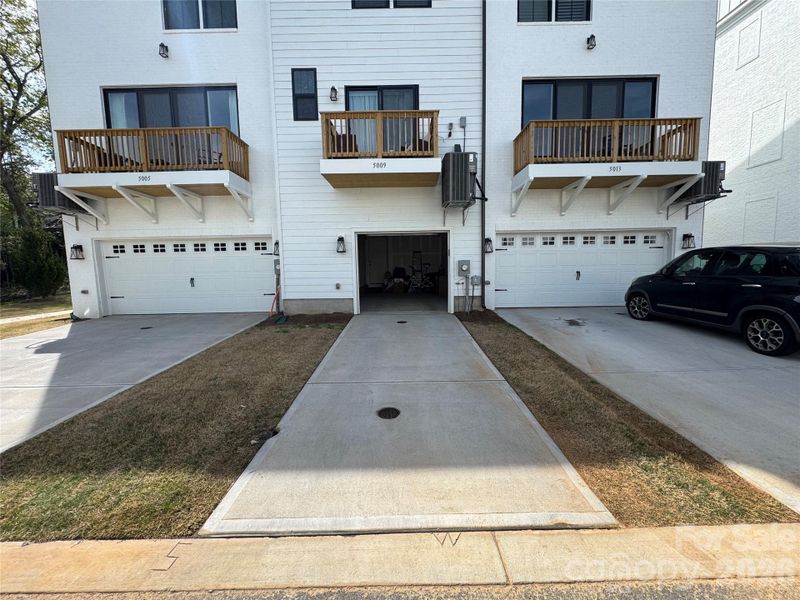 Exterior details and patio area of a home in Alexander Providence Townhomes, Charlotte (Image 1). Exterior details and patio area of a home in Alexander Providence Townhomes, Charlotte (Image 1).
