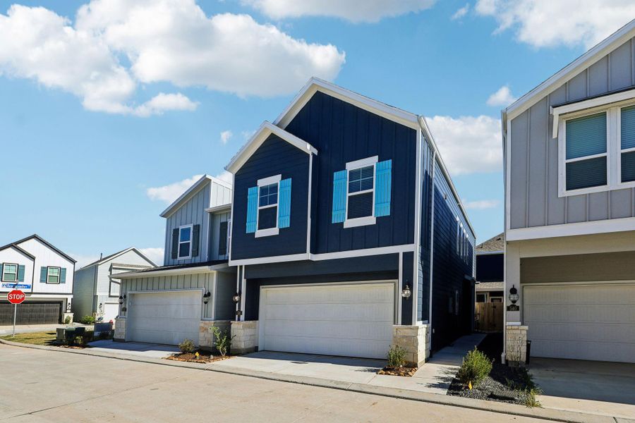 Front exterior of a new home in , Kemah, TX, highlighting curb appeal (Image 2).