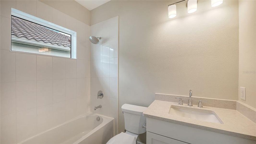 Furnished interior view inside a new home in Grand Park, Sarasota (Image 12).