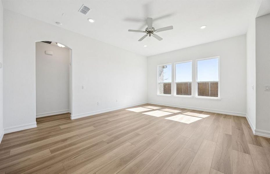 Sunlit gathering room designed for relaxation and entertainment Sunlit gathering room designed for relaxation and entertainment