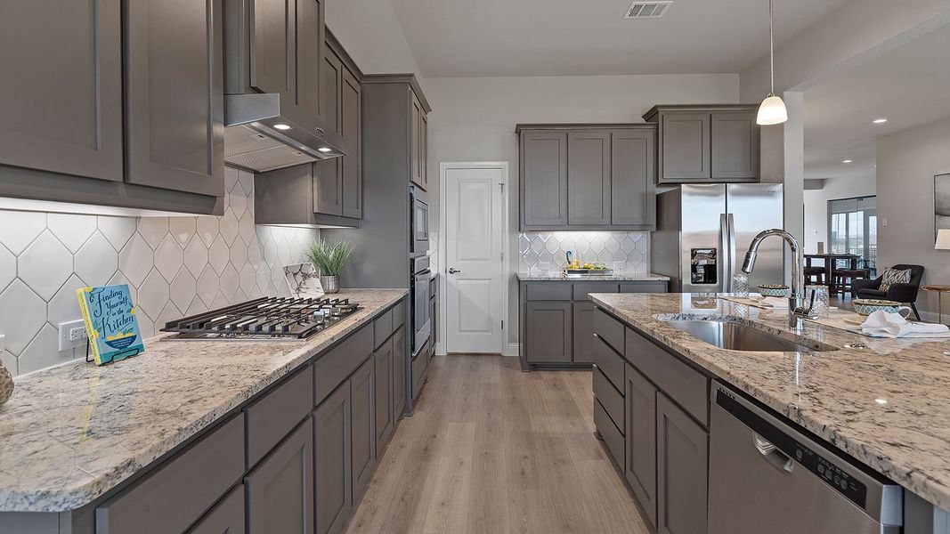 Representative furnished interior of a home built from the Guadalupe by D.R. Horton in Eden Ranch, Arlington (Image 8).