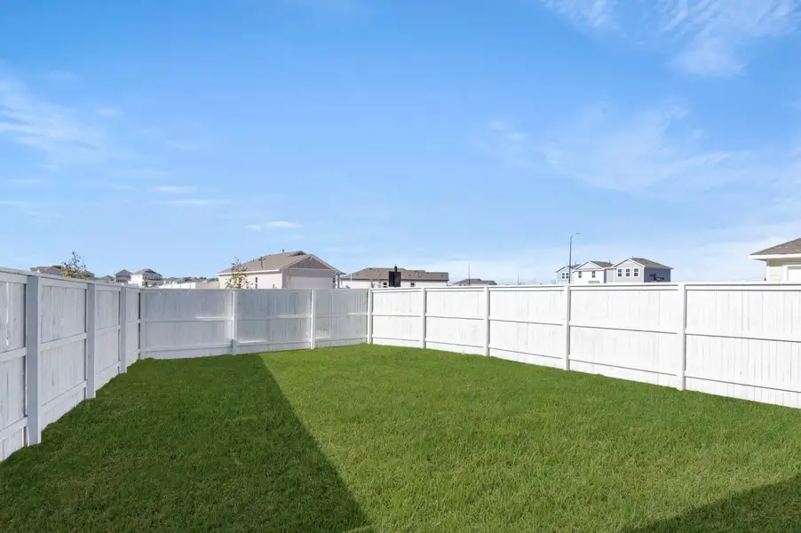 Exterior details and patio area of a home in Harvest Ridge, Elgin (Image 4).