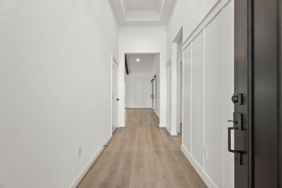 This pretty foyer welcomes family, guests, and friends!