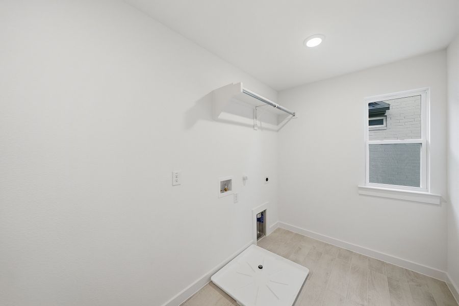 Spacious, unfurnished interior of a new home in Light Farms Brenham - 40' Lots, Celina (Image 29).