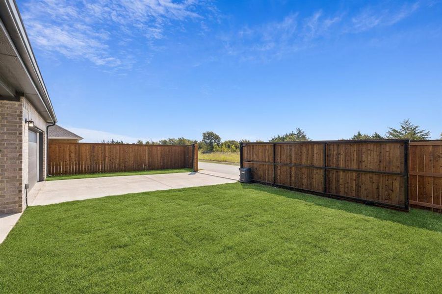 View of yard with a patio