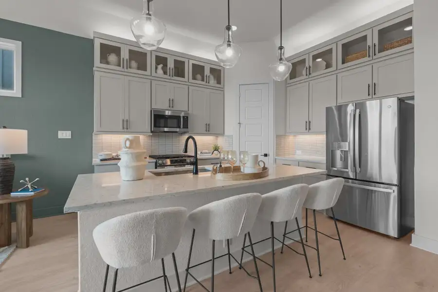 Furnished interior view inside a new home in Centero at Stone Oak, San Antonio (Image 2).