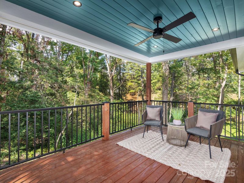 Spacious and private back porch extends living space outdoors