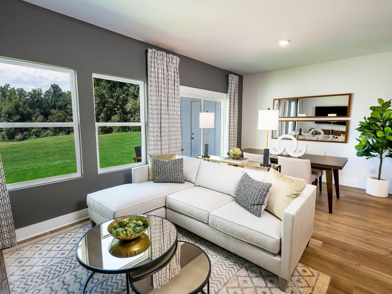 Enjoy family nights in the spacious great room. Photography from City Station Townes. Enjoy family nights in the spacious great room. Photography from City Station Townes.