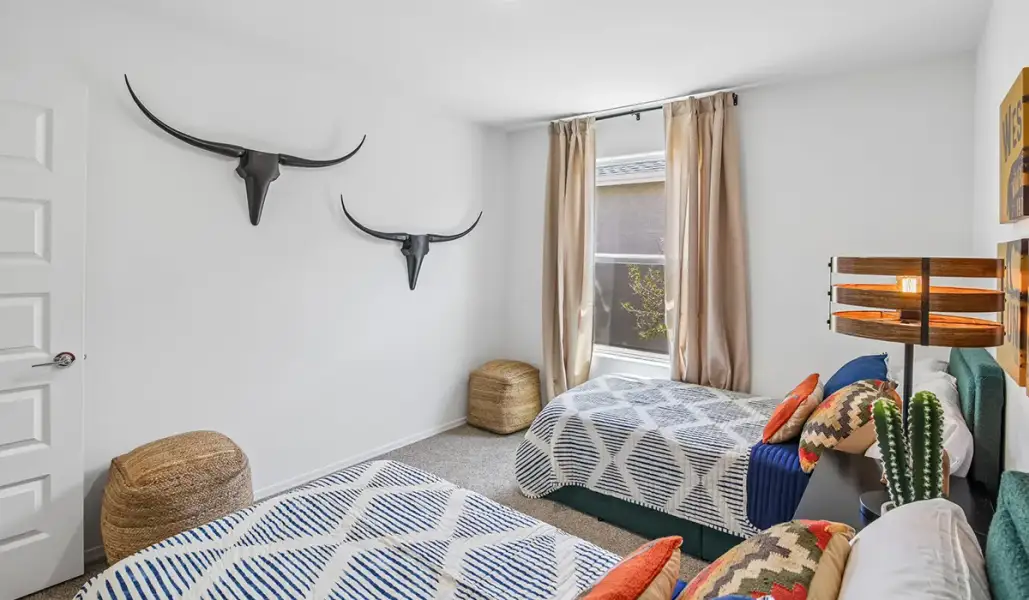 Representative furnished interior of a home built from the Bronco - T40B by D.R. Horton in Sorrel Ridge Estates, Tucson (Image 16).