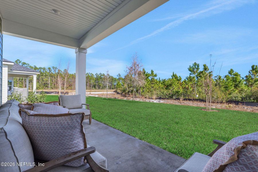 Exterior details and patio area of a home in Seminole Trace, Palm Coast (Image 32).