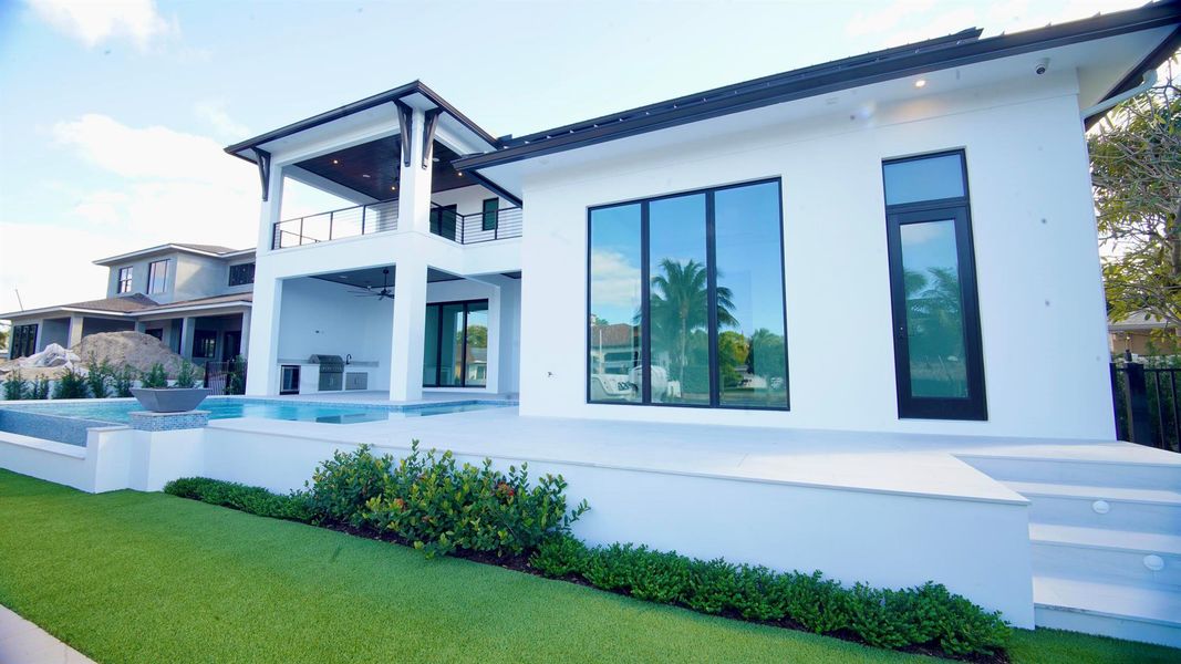 Exterior details and patio area of a home in , Palm Beach Gardens (Image 36).