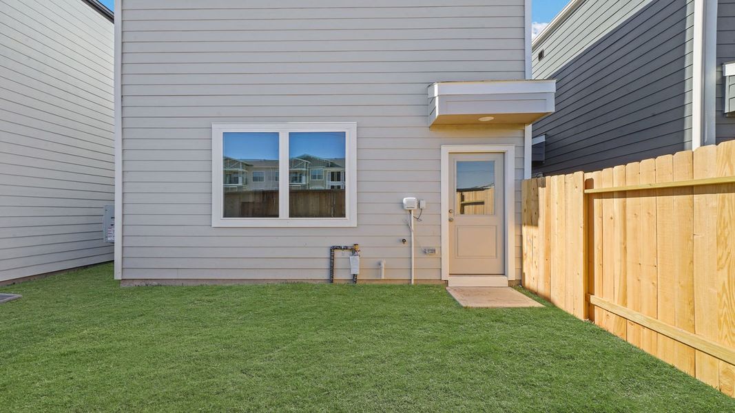 Exterior details and patio area of a home in Bridges on Lake Houston Villas, Humble (Image 3). Exterior details and patio area of a home in Bridges on Lake Houston Villas, Humble (Image 3).