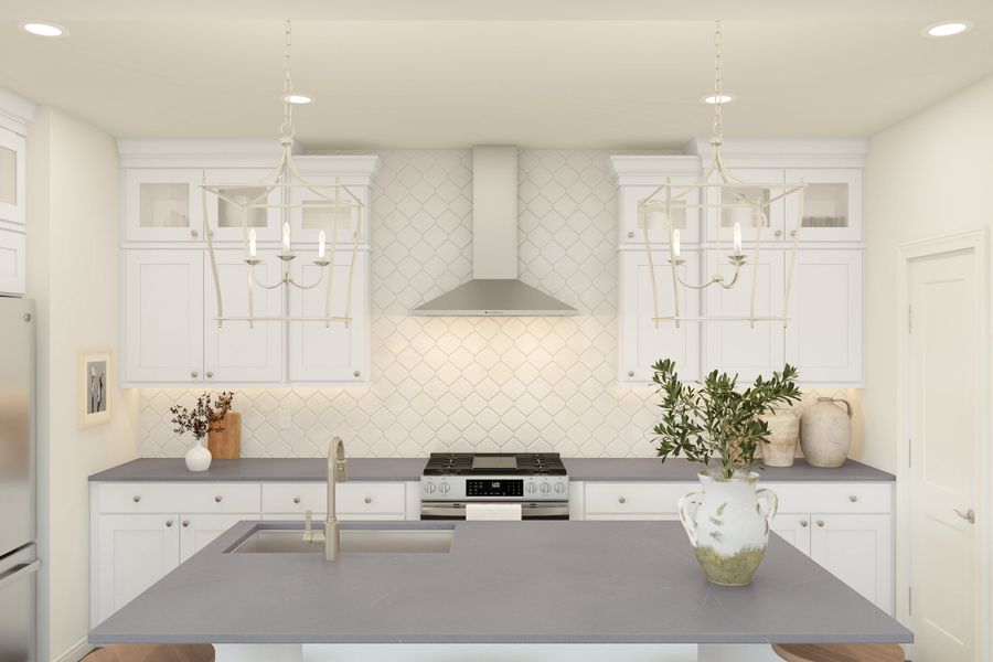 Kitchen with hexagonal backsplash and stainless steel appliances