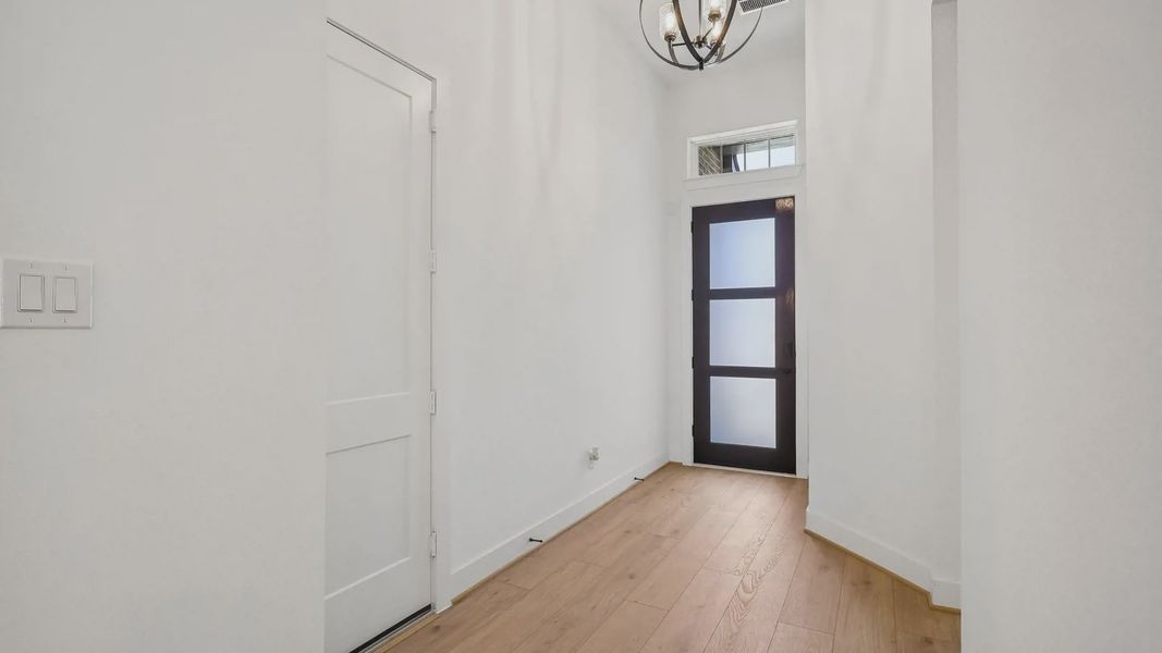 Representative unfurnished interior of a home built from the Oxford by Chesmar Homes in Parkside on the River, Georgetown (Image 13).