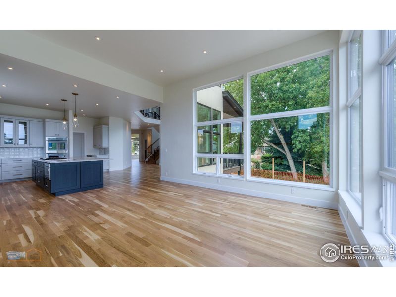 Living Room With 12' Ceiling And Walls Of Glass