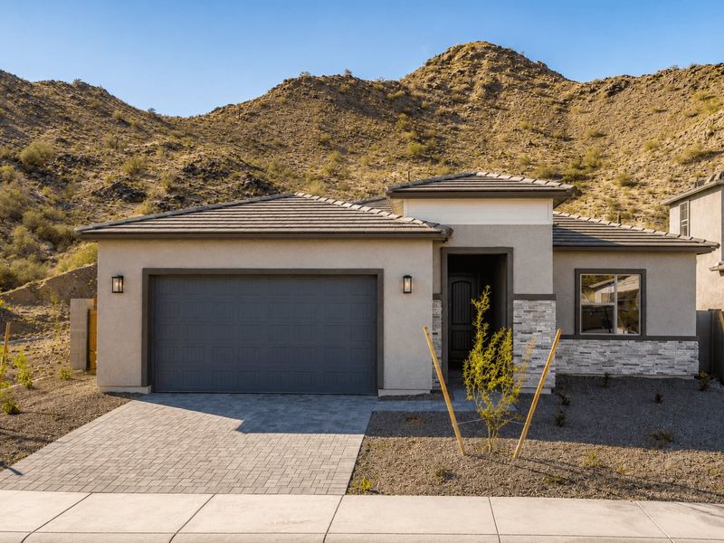 Representative exterior photo of a completed home built from the Cypress by William Ryan Homes in The Ridge at Sienna Hills, Buckeye, AZ (Image 24).