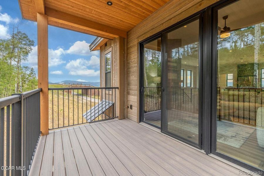 Exterior details and patio area of a home in , Granby (Image 28).