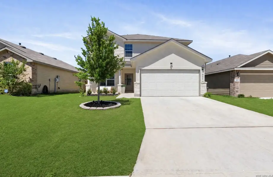 Front exterior of a new home in , San Antonio, TX, highlighting curb appeal (Image 2). Front exterior of a new home in , San Antonio, TX, highlighting curb appeal (Image 2).