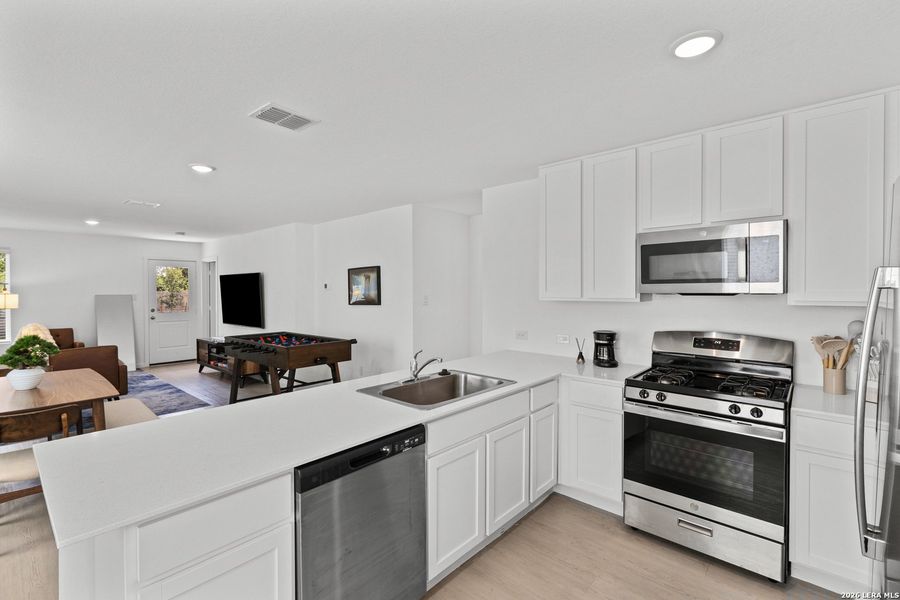 Furnished interior view inside a new home in Torian Village, San Antonio (Image 12).