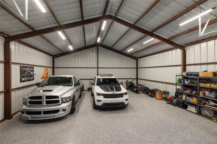 Garage featuring metal wall