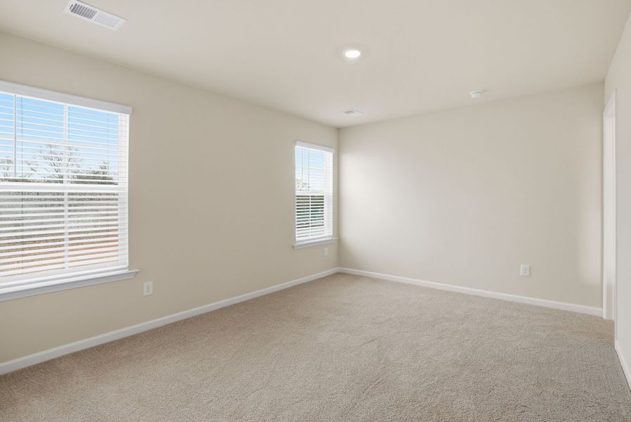 Representative unfurnished interior of a home built from the Juniper B by McGuinn Homes in Hunters Branch, Hopkins (Image 40).