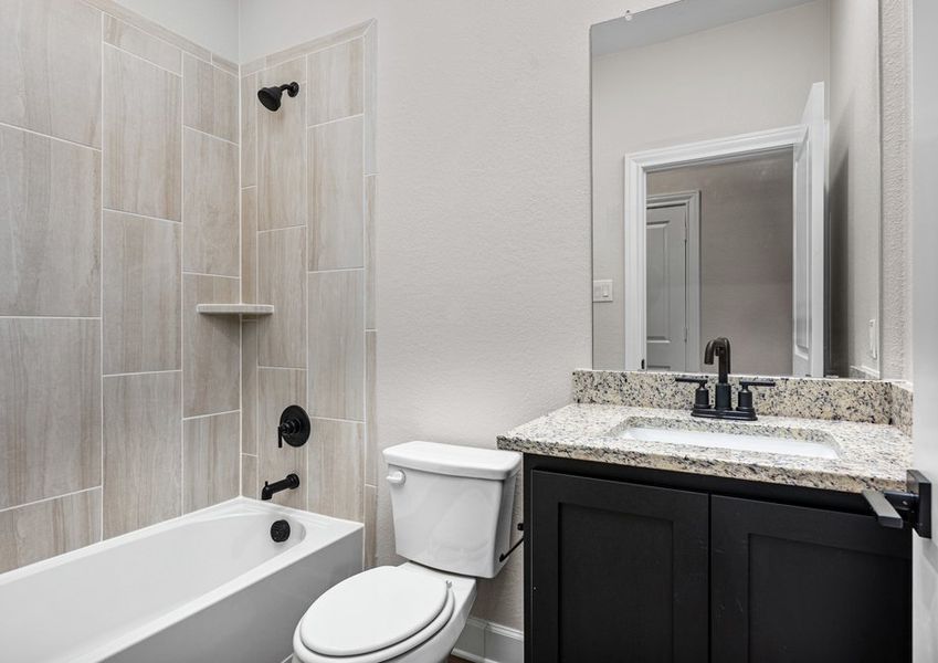 The secondary bathroom has a nice vanity and shower-tub combo. The secondary bathroom has a nice vanity and shower-tub combo.