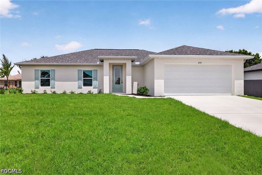 Front exterior of a new home in Cape Coral, Cape Coral, FL, highlighting curb appeal (Image 1). Front exterior of a new home in Cape Coral, Cape Coral, FL, highlighting curb appeal (Image 1).