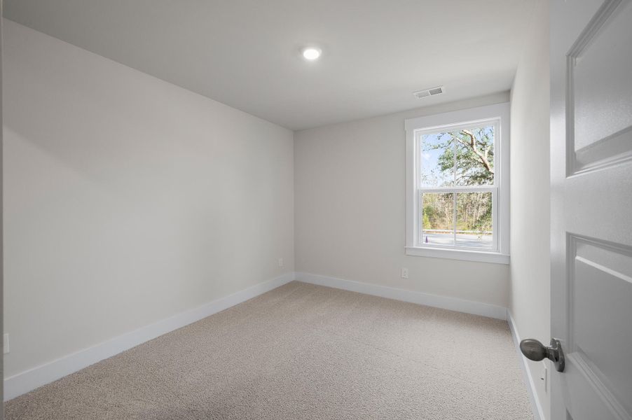 Photo is of a similar home