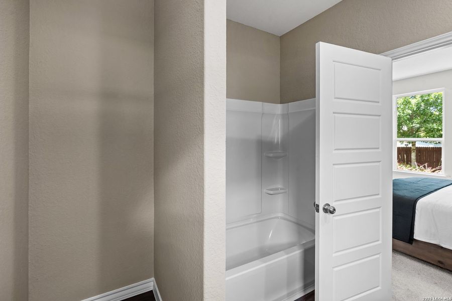 Furnished interior view inside a new home in Davis Ranch, San Antonio (Image 19).