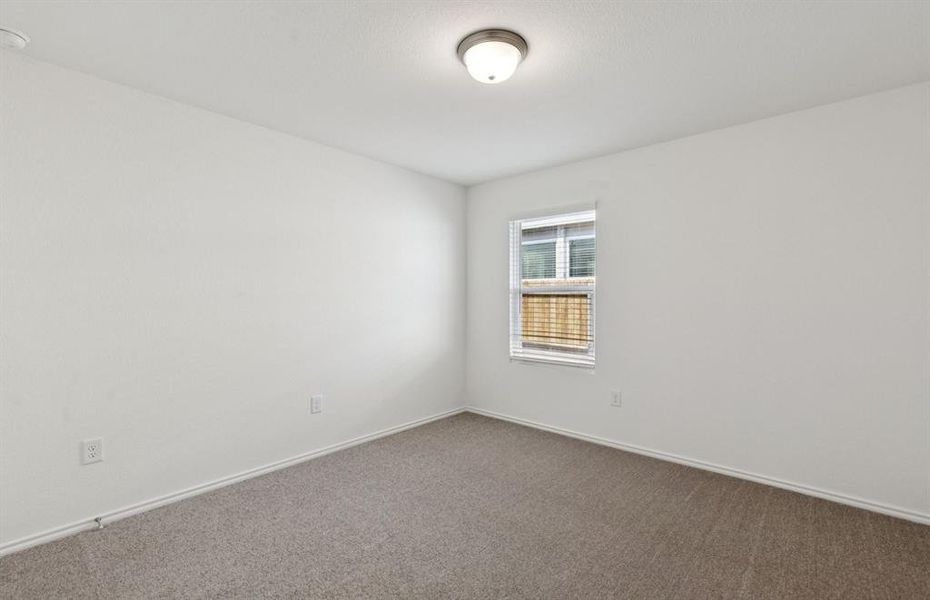 Secondary bedroom designed for comfort and convenience Secondary bedroom designed for comfort and convenience