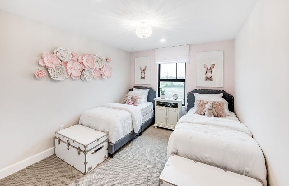 Bedroom 2 shown with 2 beds