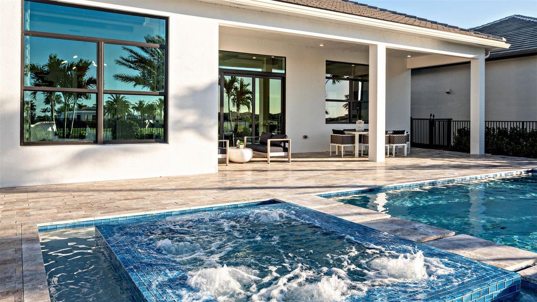 Exterior details and patio area of a home in Cresswind Palm Beach at Westlake, Westlake (Image 4).