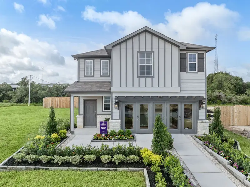 A house with a driveway. A house with a driveway.