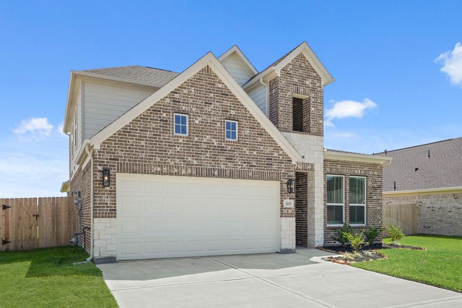 Front exterior of a new home in Briarwood Crossing, Rosenberg, TX, highlighting curb appeal (Image 2).
