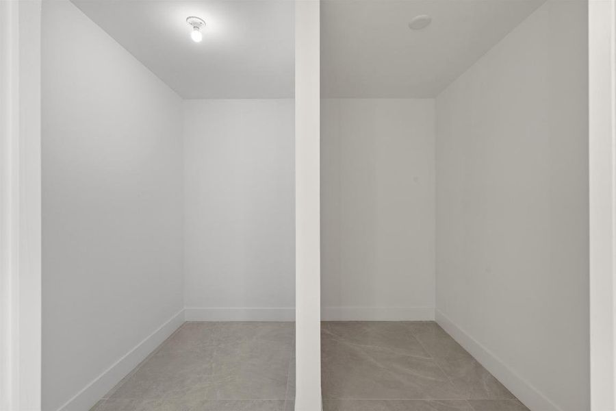 PRIMARY WALK IN CLOSET