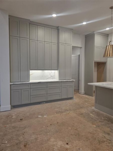 Plenty of custom cabinets.