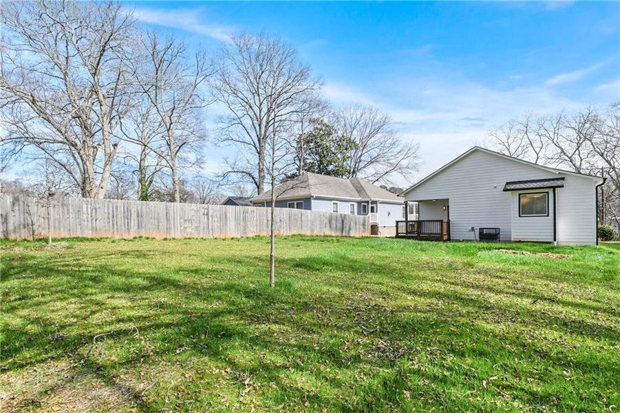 Front exterior of a new home in , Atlanta, GA, highlighting curb appeal (Image 1).