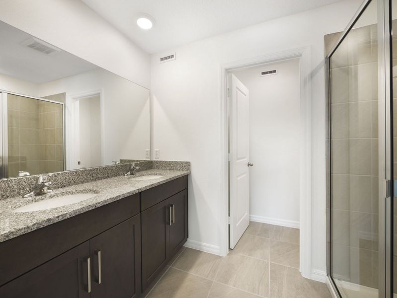 Furnished interior view inside a new home in Towns at Greenleaf, Oviedo (Image 10).