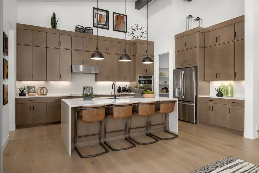 Representative furnished interior of a home built from the 2483 Modeled by KB Home in Windler Midtown Starlight, Aurora (Image 5).