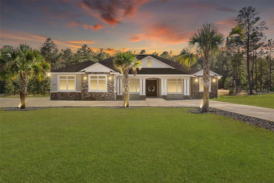Front exterior of a new home in , Ocala, FL, highlighting curb appeal (Image 22).