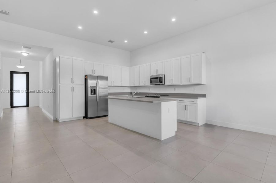 Furnished interior view inside a new home in Century Royal Homes, Homestead (Image 3).