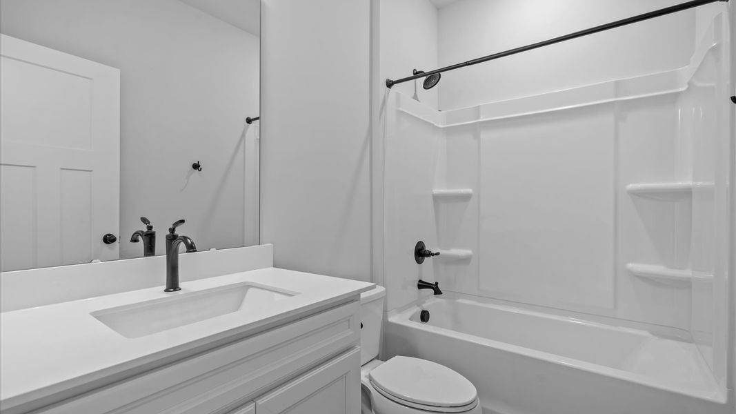 Stylish guest bathroom with superior design and thoughtful storage solutions