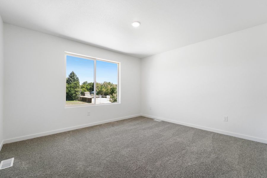 Spacious, unfurnished interior of a new home in Conestoga, Ault (Image 22).