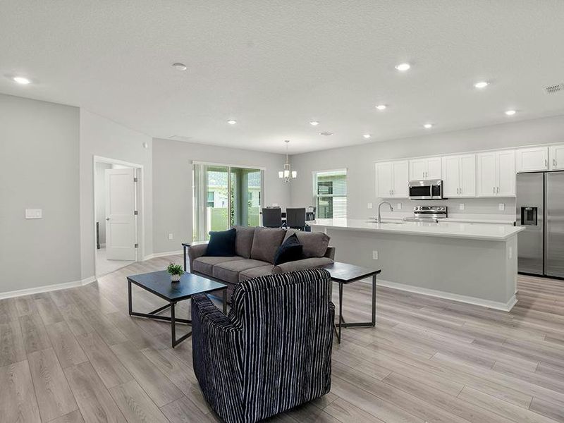 Enjoy a sunny, open living area with LVP flooring.